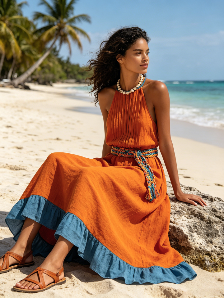 Fiammetta | Abito maxi halter arancio con plissé e balza azzurra