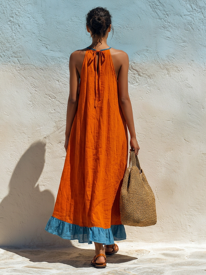 Fiammetta | Abito maxi halter arancio con plissé e balza azzurra