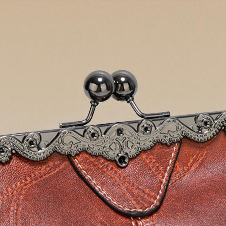Borsa vintage con chiusura a scatto