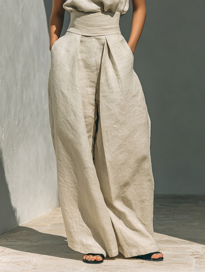 Set composto da camicetta senza maniche e pantaloni a gamba larga in misto cotone e lino.