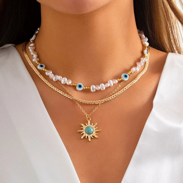 Set di Collane a Strati Parel &amp; Occhio Maligno – Ciondolo Sole Boho