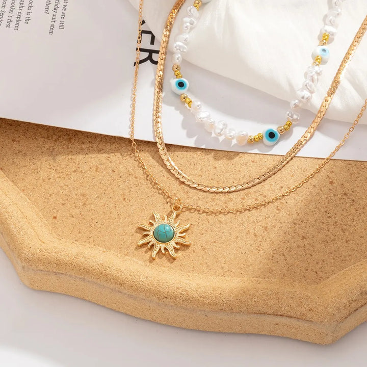 Set di Collane a Strati Parel &amp; Occhio Maligno – Ciondolo Sole Boho