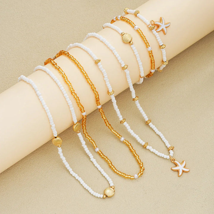 Set di gioielli con stelle marine e perline - 6 pezzi