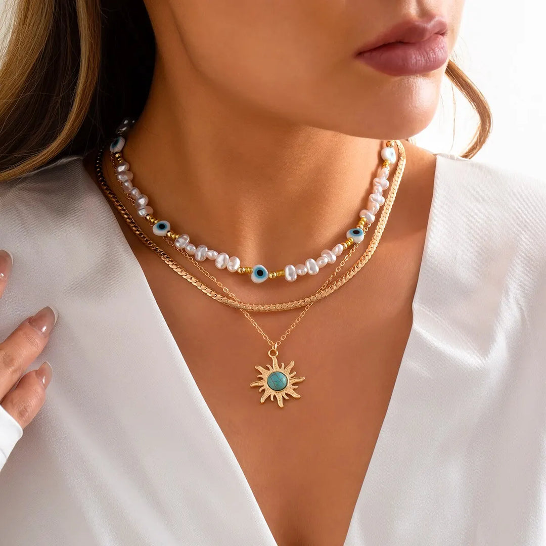 Set di Collane a Strati Parel &amp; Occhio Maligno – Ciondolo Sole Boho