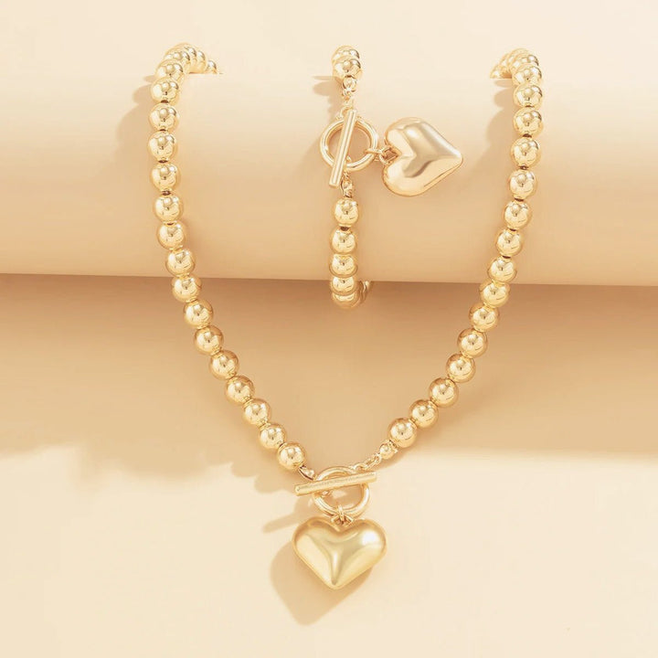 Set di bracciale e collana con pendente a cuore in perline da 2 pezzi