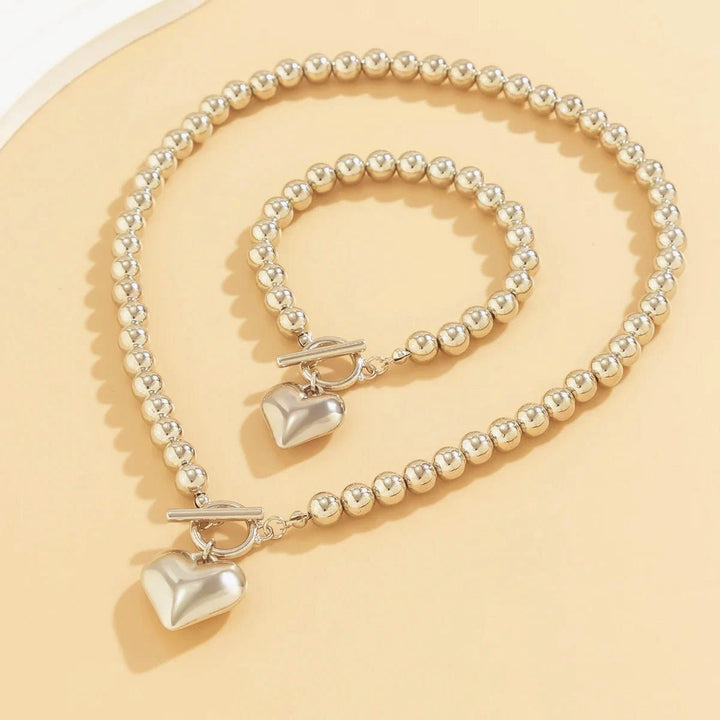 Set di bracciale e collana con pendente a cuore in perline da 2 pezzi