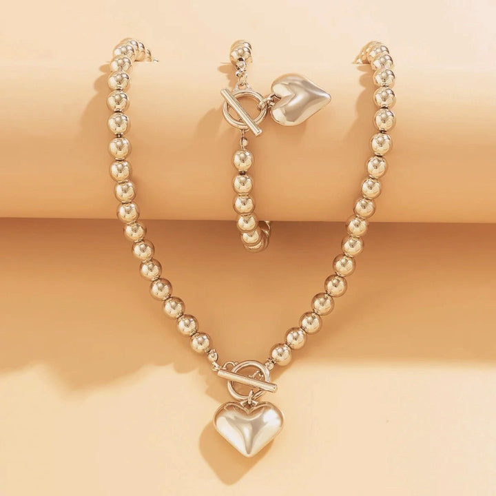 Set di bracciale e collana con pendente a cuore in perline da 2 pezzi